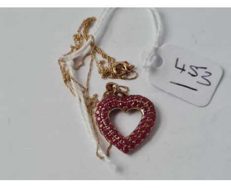 A ruby and diamond heart pendant necklace - 2.1 gms 
