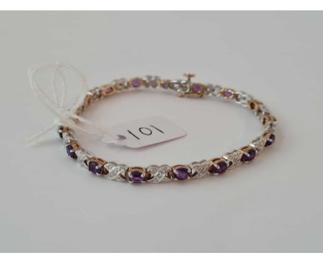 An amethyst and diamond 9ct bracelet 9.9g inc