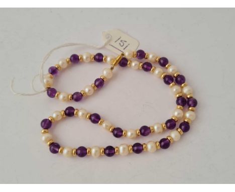 A amethyst and pearl bead necklace with 9ct clasp 