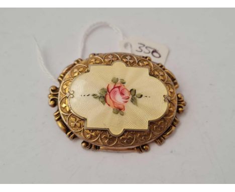 A enamel rose brooch 