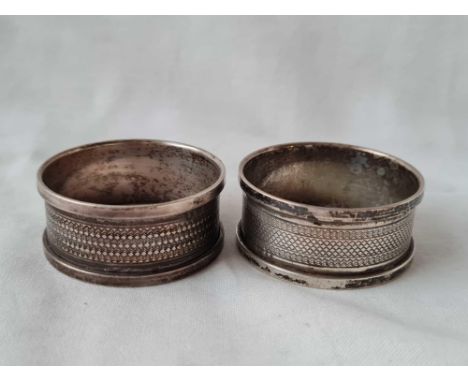 A pair of napkin rings, engine turned, B'ham 1934