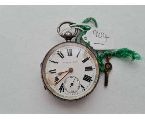 A gents large silver pocket watch with key "improved patent" with seconds dial enamel face damaged 