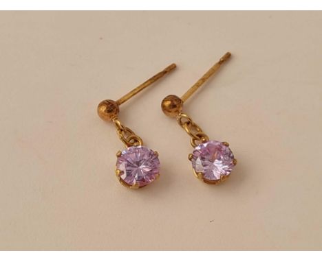 A pair of amethyst ear studs