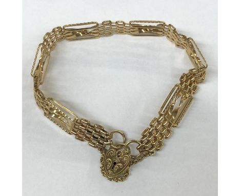 9CT GOLD GATE BRACELET WITH HEART PADLOCK AND SAFETY CHAIN 9.5G APPROX