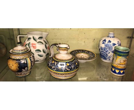 SHELF OF CASTELLI POTTERY JUGS AND VASES