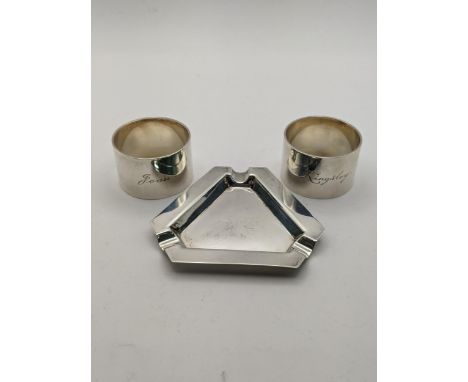 Silver compromising of a pair of napkin rings engraved and an ashtray 158g.Location: 