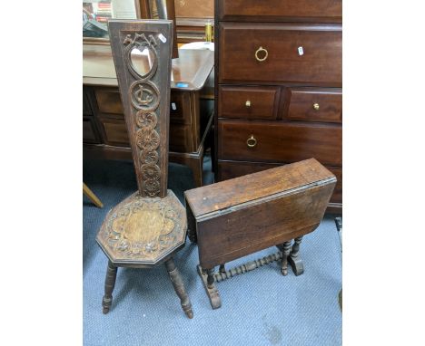 A late 19th century Welsh carved Love chair, together with a Sutherland table having bobbin turned legs Location: RWF 