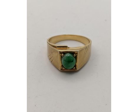 14ct gold signet ring having a central oval cut jade, total weight 7.8gLocation: 