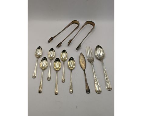 Silver cutlery to include six silver tea spoons, hallmarked London 1935, together with  two pairs of sugar thongs, one pair h