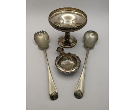 Silver items to include tea strainer, footed dish and silver plated saladier 