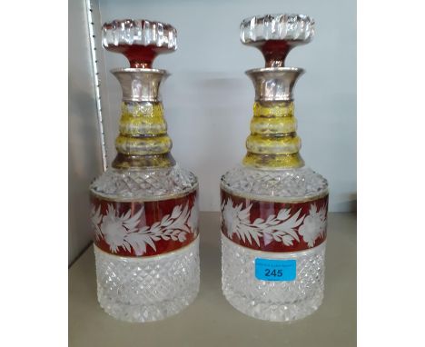 A pair of cut glass decanters having silver collarsLocation: 2:2 
