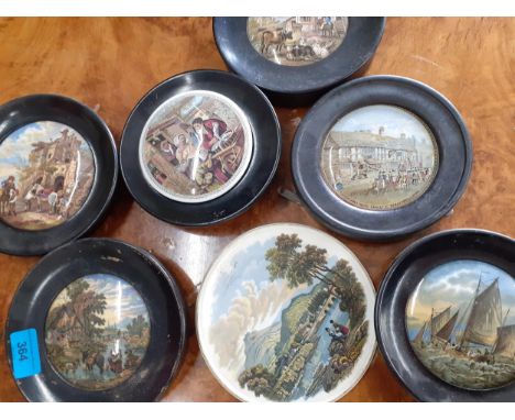 A group of ceramic pot lids in in ebonized framesLocation: RAB 