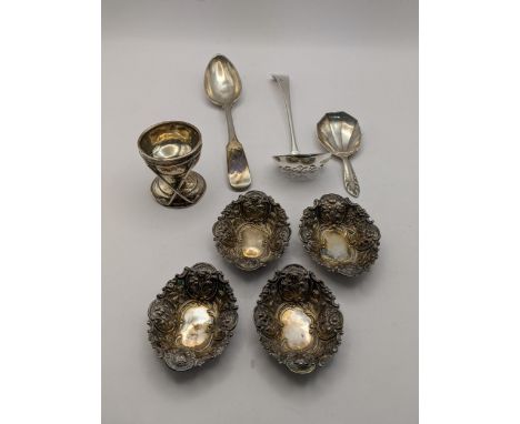 Mixed silver to include an egg cup, a small pierced ladle, a fiddle pattern spoon, 4 miniature embossed dish and one other, w