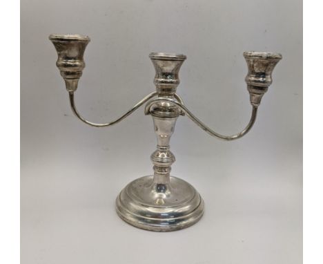 A silver three branch candelabra hallmarked Birmingham 1990 