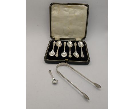 A set of six silver tea spoons Sheffield 1939, together with a pair of silver sugar tongs and one other total weight 125.3g 