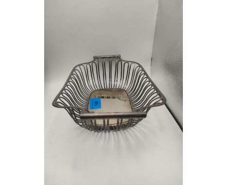 A silver wire woven rectangular basket with opposing handles, bears indistinct hallmarks, Sheffield 339gLocation: 