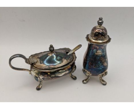 A silver mustard pot Birmingham 1964 together with a silver pepper pot total weight 103.7gLocation: 