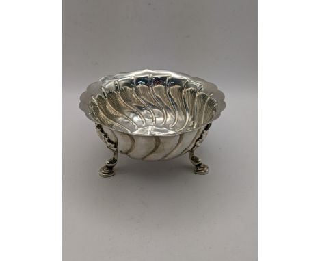 A silver three footed bowl hallmarked London 1900 total weight 194.5gLocation: 