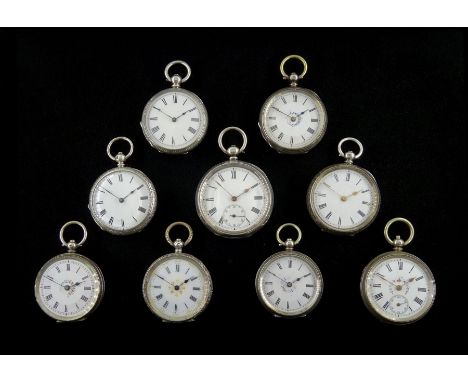 Nine 19th/early 20th century ladies silver key wound cylinder fob and pocket watches, white enamel dials with Roman numerals,