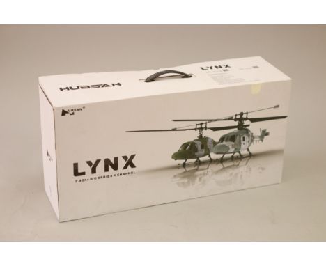 A Lynx 2.4Ghz R/C Helicopter, boxed with power cable and remote 