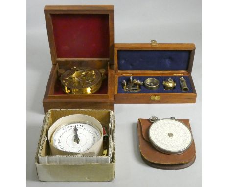 A contemporary brass novelty set of sextant, compass, divers helmet and telescope, case, a compass, case, a quartz tide dial 