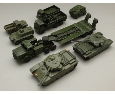 A collection of Die-cast military vehicles to include - Dinky Tank Transporter, Army Wagon, Army Tank, Artillery Tractor, Per