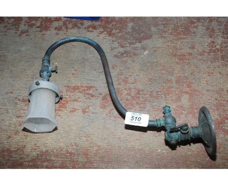 A gas wall-bracket light fitting.
