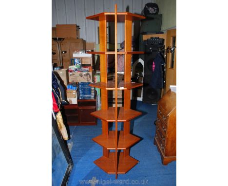 A six-shelf free-standing display unit of Danish design. 77'' high x 25'' x 17''.