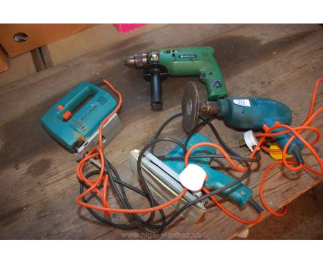 A "Hitachi" drill and a "Black &amp; Decker" electric drill, a jig-saw and a sander.