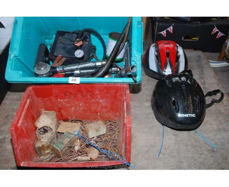 A box of nails, flexi pipe fittings, an air pump, bicycle helmets, etc.,
