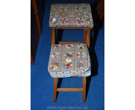 Two nicely worked tapestry-upholstered wooden-framed stools.
