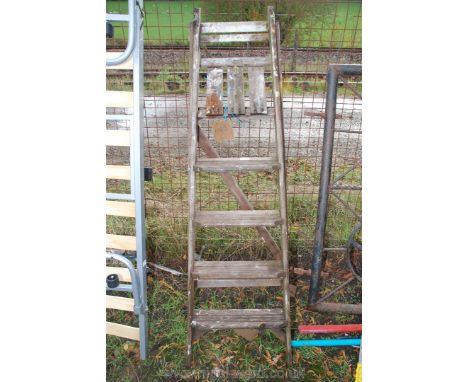 A five step wooden Step ladder.