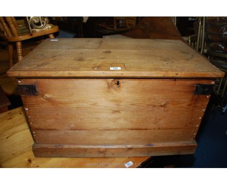 A Pine trunk/blanket box with steel strapped corners. 32'' x 19'' x 18'' high.