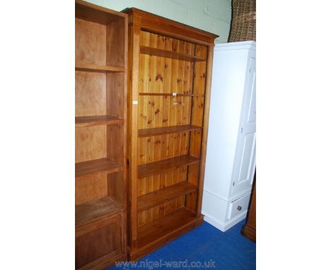 A Pine five-shelf display cabinet, 78'' high x 38'' wide x 10'' deep.