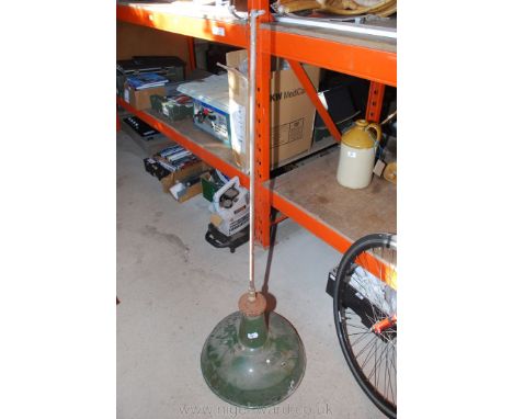A green enamel light shade and mounting bar.
