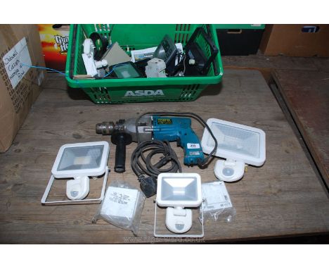 A quantity of mainly L.E.D. outside light fittings, a cord-less telephone, phone jacks and a "Makita" reversible drill. (Dril