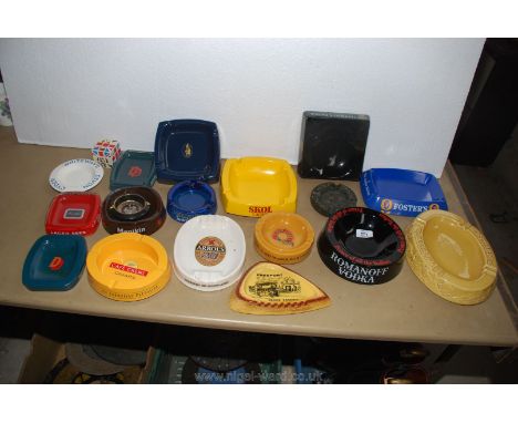 Two small boxes of ceramic and other trade advertising tavern ashtrays.