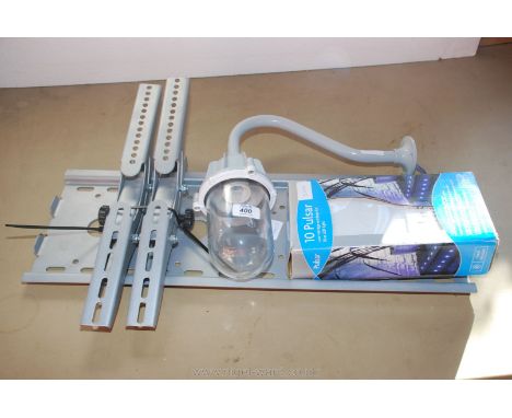 A wall-fitting outside light fitment, a flat-screen T.V. wall-bracket and L.E.D. outside lighting.