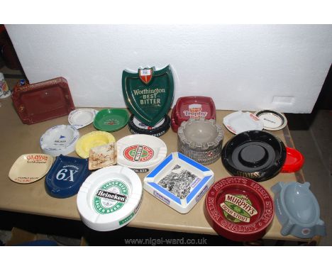 A good quantity of ceramic trade advertising tavern ashtrays.