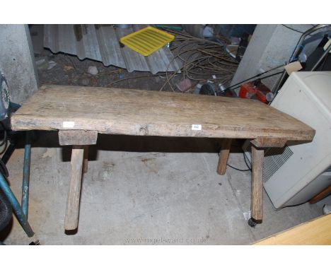 A Pig bench style Seat. 49" x 21" x 19".