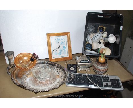 Two plated trays, a computer keyboard, an egg-timer, china, etc.,
