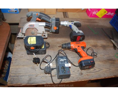 A battery circular saw with charger, an "Einhell" battery driver and charger and a "Black &amp; Decker" battery drill.