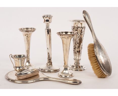 A silver vase, WA, Birmingham 1903, pierced and engraved, a pair of plain silver vases of similar form, a candlestick, nail b