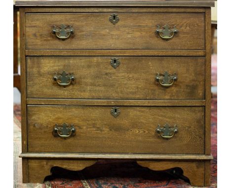 A 19th Century oak chest fitted three drawers on bracket feet, 78.5cm wide  CONDITION REPORT: Top is split, wear to drawer li