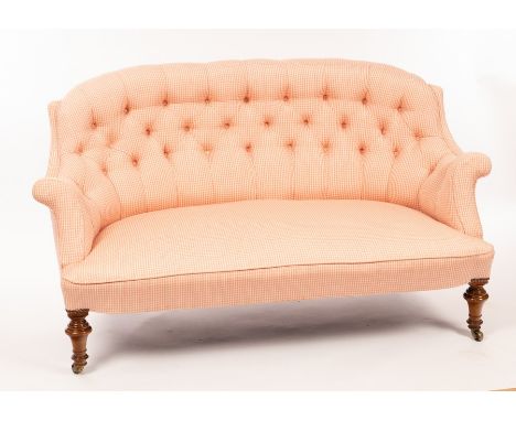 A late Victorian two-seater settee with button upholstered back on turned front legs with castors, 146cm wide CONDITION REPOR