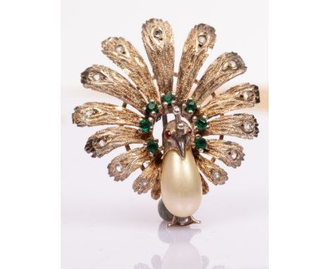 A novelty sterling silver costume brooch modelled as a peacock with a faux pearl body, 4cm high CONDITION REPORT: Condition i