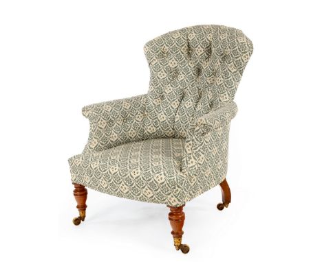 A Howard & Sons button back armchair, on turned front legs with castors, one back leg numbered 14577/3901/see illustration CO