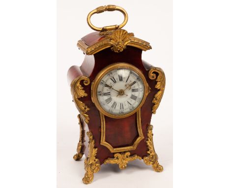 A late 19th Century French eight-day mantel clock, tortoiseshell and gilt metal mounted with porcelain dial and Roman and Ara
