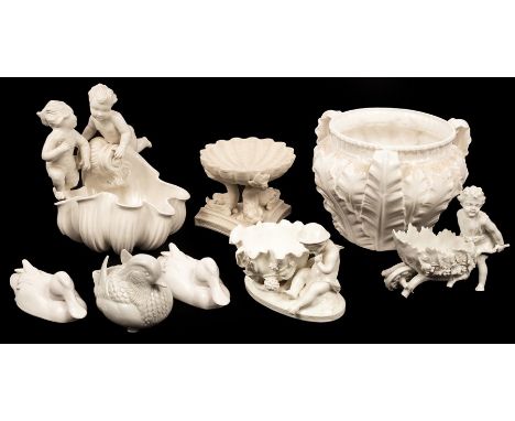 A Royal Worcester pearlware three-handled jardinière, 18cm high, three white glazed figures of industrious putti, three figur