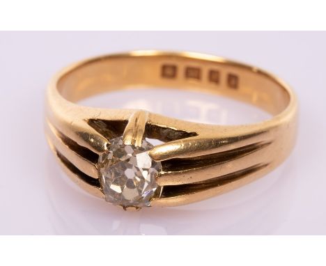 A gentleman's diamond solitaire ring, the cushion shaped stone of approximately 0.85ct, set in 18ct yellow gold, size T½ COND